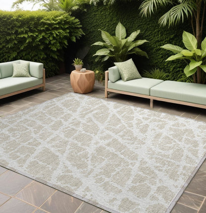 9' X 12' Beige and Ivory Abstract Washable Non Skid Indoor Outdoor Area Rug - 0" (L) x 144" (W) x 108" (H)