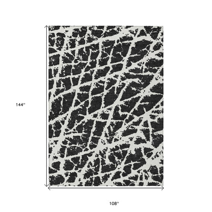 9' X 12' Black and White Abstract Washable Non Skid Indoor Outdoor Area Rug - 0" (L) x 144" (W) x 108" (H)