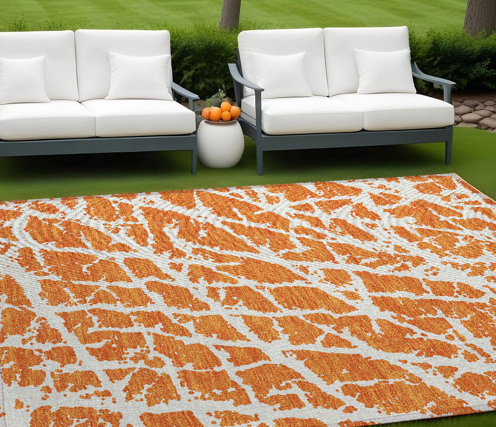 8' X 10' Orange and White Abstract Washable Non Skid Indoor Outdoor Area Rug