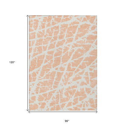 8' X 10' Peach and Ivory Abstract Washable Non Skid Indoor Outdoor Area Rug