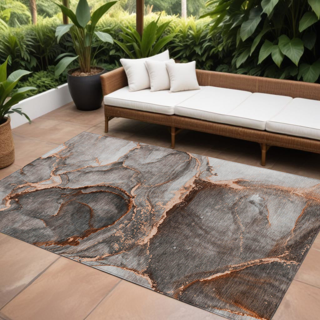 9' X 12' Peach Abstract Washable Indoor Outdoor Area Rug