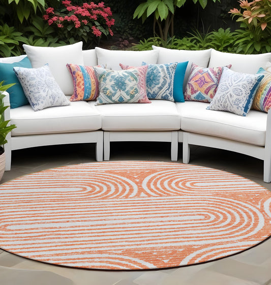 8' X 8' Orange and Ivory Round Abstract Washable Non Skid Indoor Outdoor Area Rug