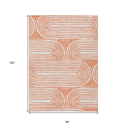 8' X 10' Orange and Ivory Abstract Washable Non Skid Indoor Outdoor Area Rug