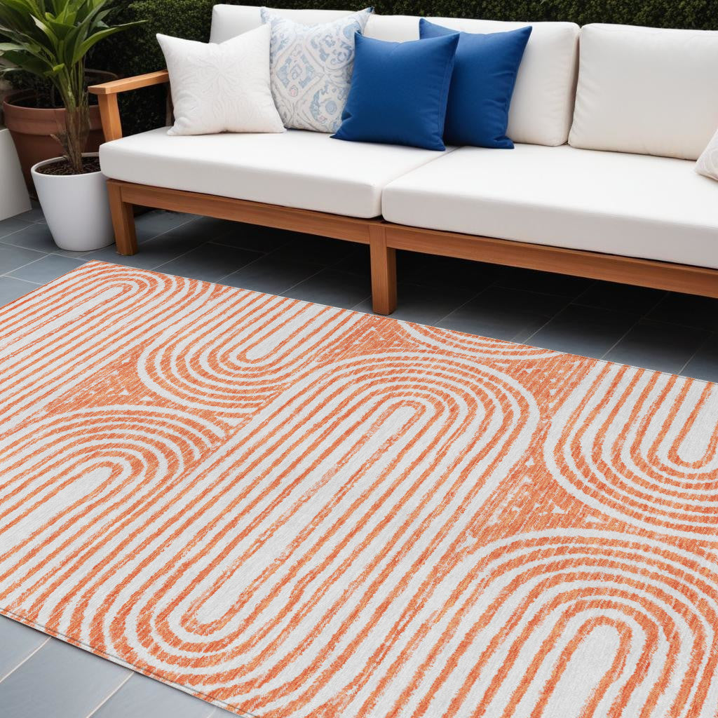 8' X 10' Orange and Ivory Abstract Washable Non Skid Indoor Outdoor Area Rug