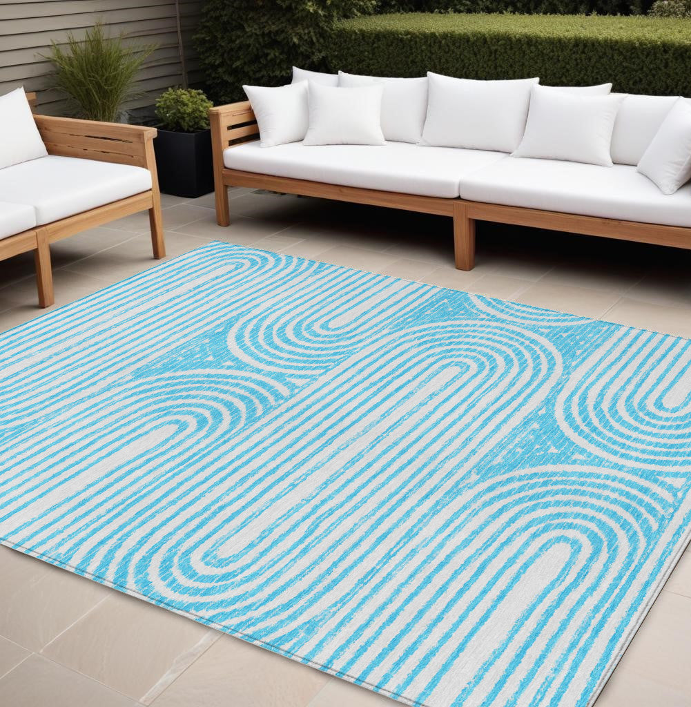 8' X 10' Teal and White Abstract Washable Non Skid Indoor Outdoor Area Rug