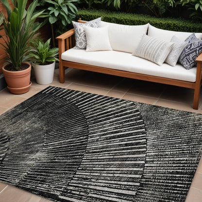 8' X 10' Black and Ivory Abstract Washable Non Skid Indoor Outdoor Area Rug