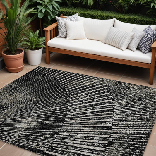 9' X 12' Black and Ivory Abstract Washable Non Skid Indoor Outdoor Area Rug