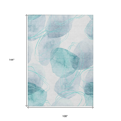 9' X 12' Teal and Ivory Abstract Washable Non Skid Indoor Outdoor Area Rug