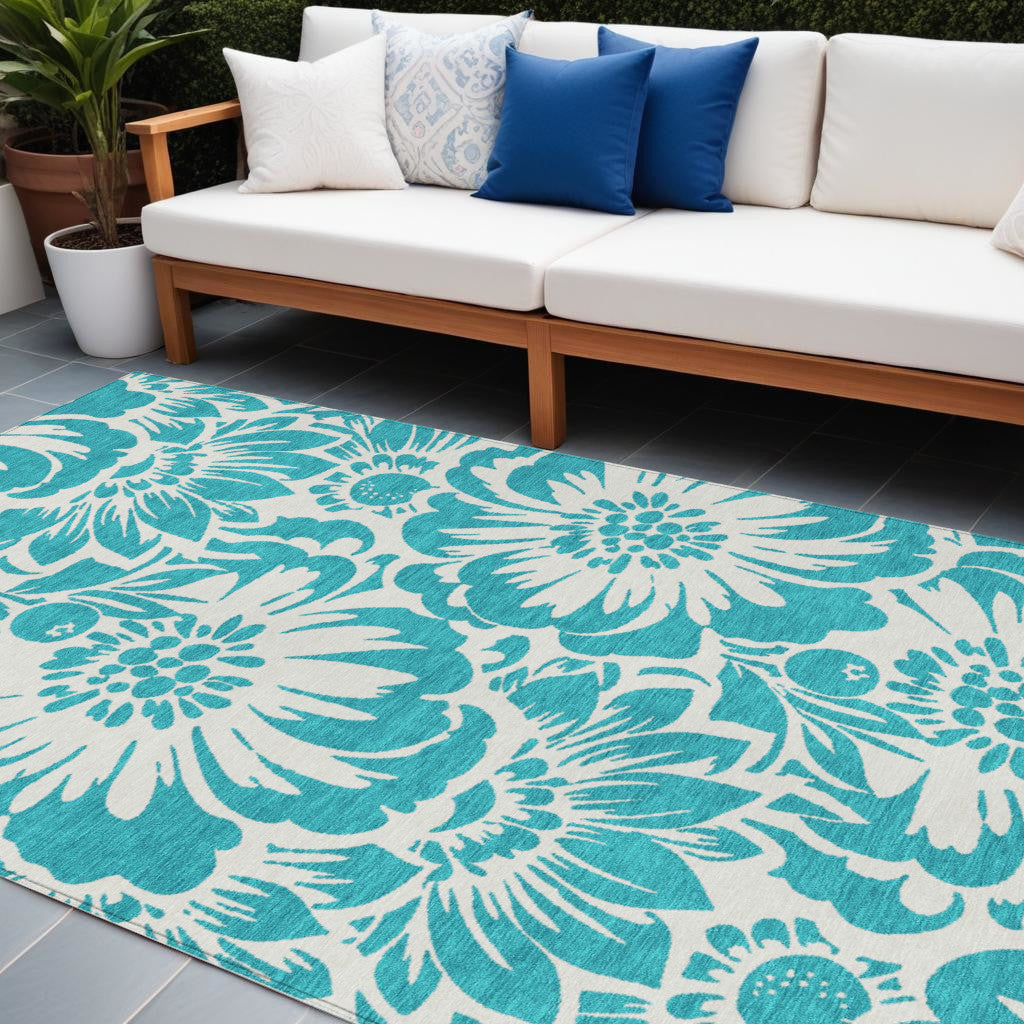 8' X 10' Teal and Ivory Floral Washable Non Skid Indoor Outdoor Area Rug