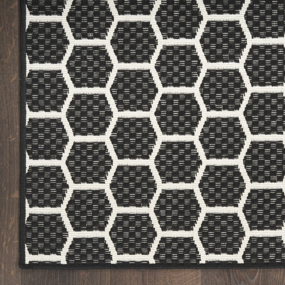 8' Black And Ivory Geometric Indoor Outdoor Runner Rug — view 3