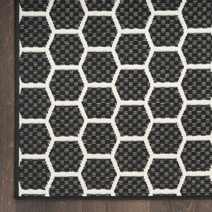 8' Black And Ivory Geometric Indoor Outdoor Runner Rug HomeRoots
