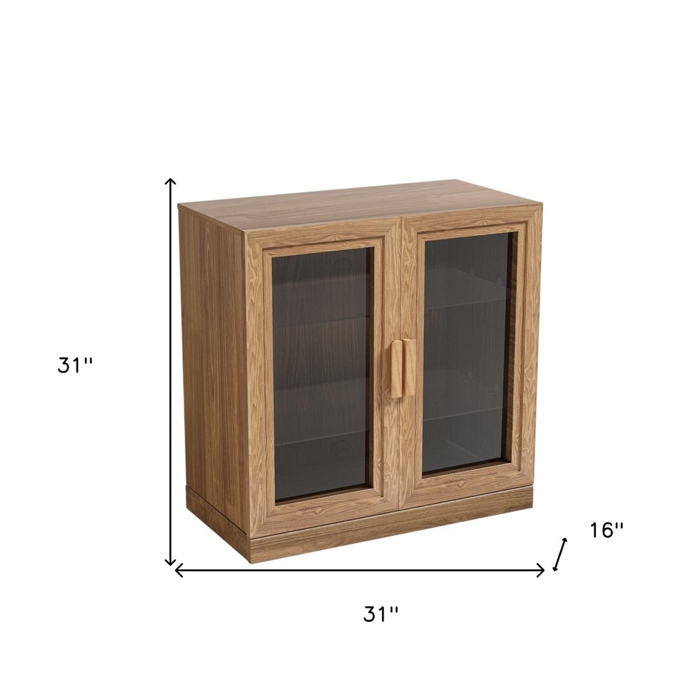 31" Natural And Clear Glass Door Accent Cabinet With Three Shelves HomeRoots