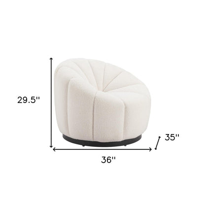 36" Cream And Black Faux Shearling And Upholstered Barrel Chair HomeRoots