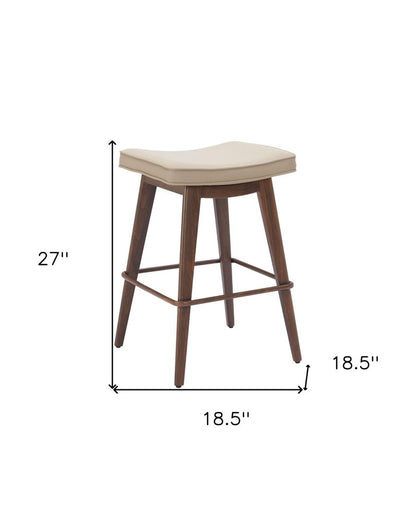 Set of Two 27" Beige And Walnut Faux Leather And Steel Backless Counter Height Bar Chairs HomeRoots