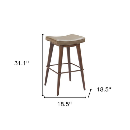 Set of Two 31" Taupe And Walnut Faux Leather And Steel Backless Bar Height Bar Chairs HomeRoots