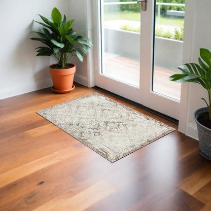 2' X 3' Beige and Ivory Damask Area Rug