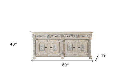 89" White Distressed Solid Wood Carved Scrollwork Four Drawer Sideboard With Four Doors HomeRoots