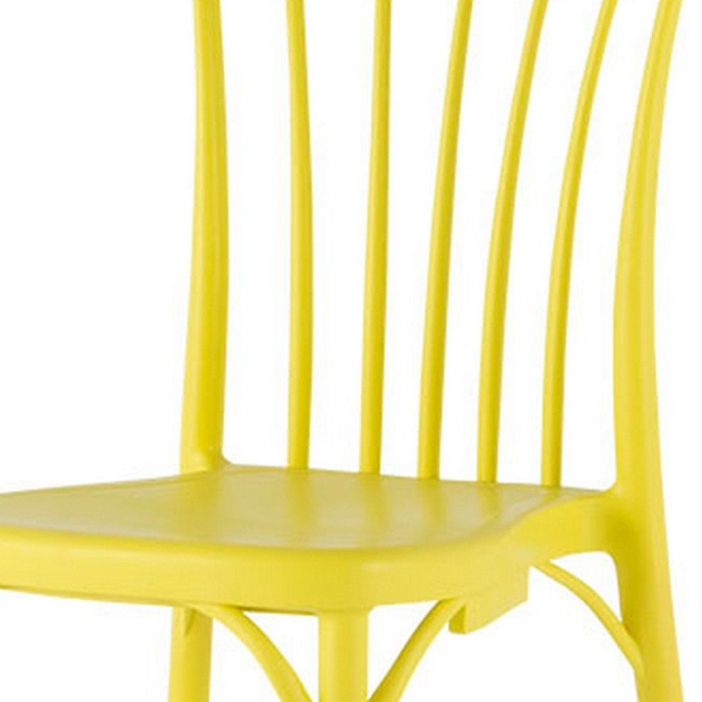 Set of Two Yellow Heavy Duty Plastic Outdoor Stacking Dining Chairs HomeRoots