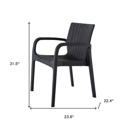 Set of Two Black Faux Rattan Heavy Duty Plastic Outdoor Stacking Arm Chairs HomeRoots