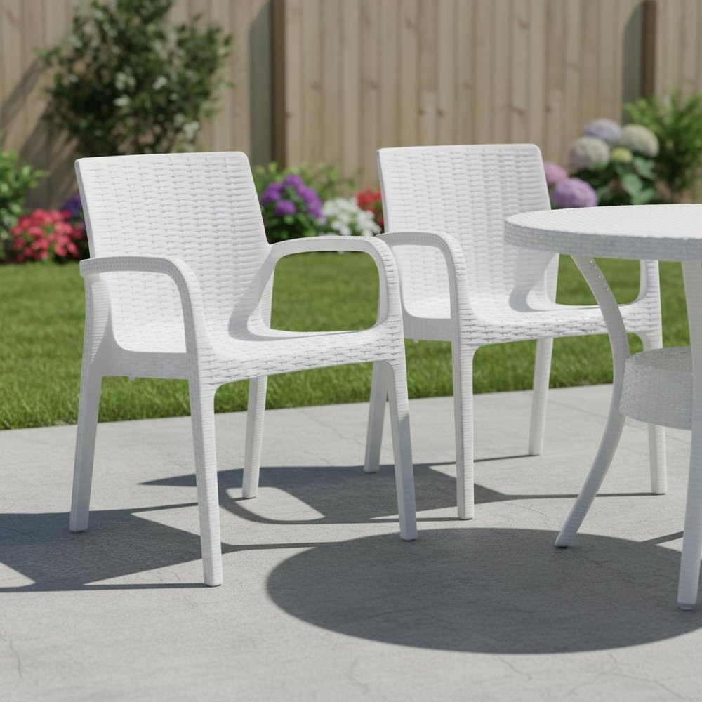 Set of Two White Faux Rattan Heavy Duty Plastic Outdoor Stacking Arm Chairs HomeRoots
