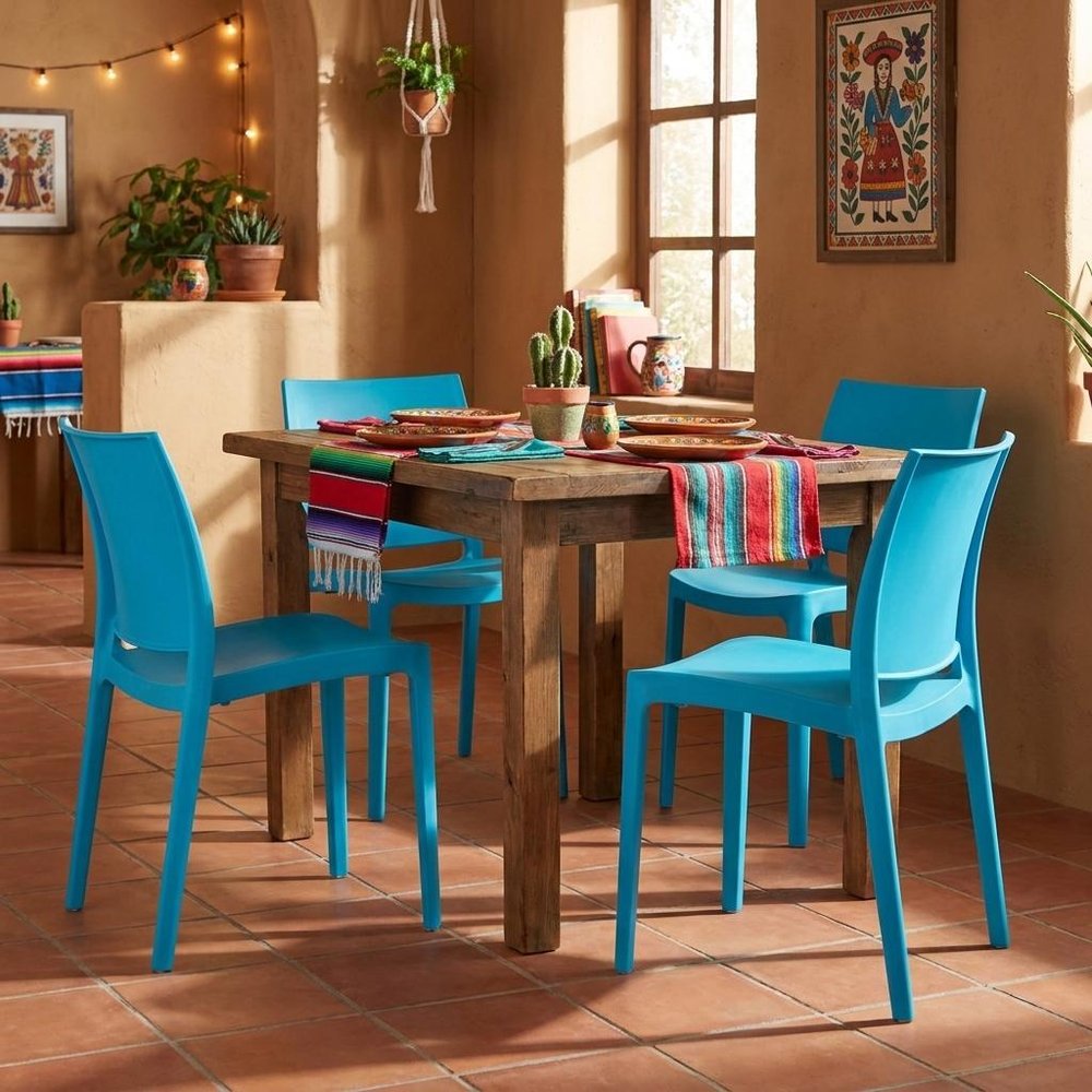 Set of Four Blue Heavy Duty Plastic Outdoor Stacking Dining Chairs HomeRoots