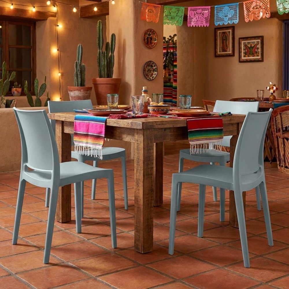 Set of Four Baby Blue Heavy Duty Plastic Outdoor Stacking Dining Chairs HomeRoots