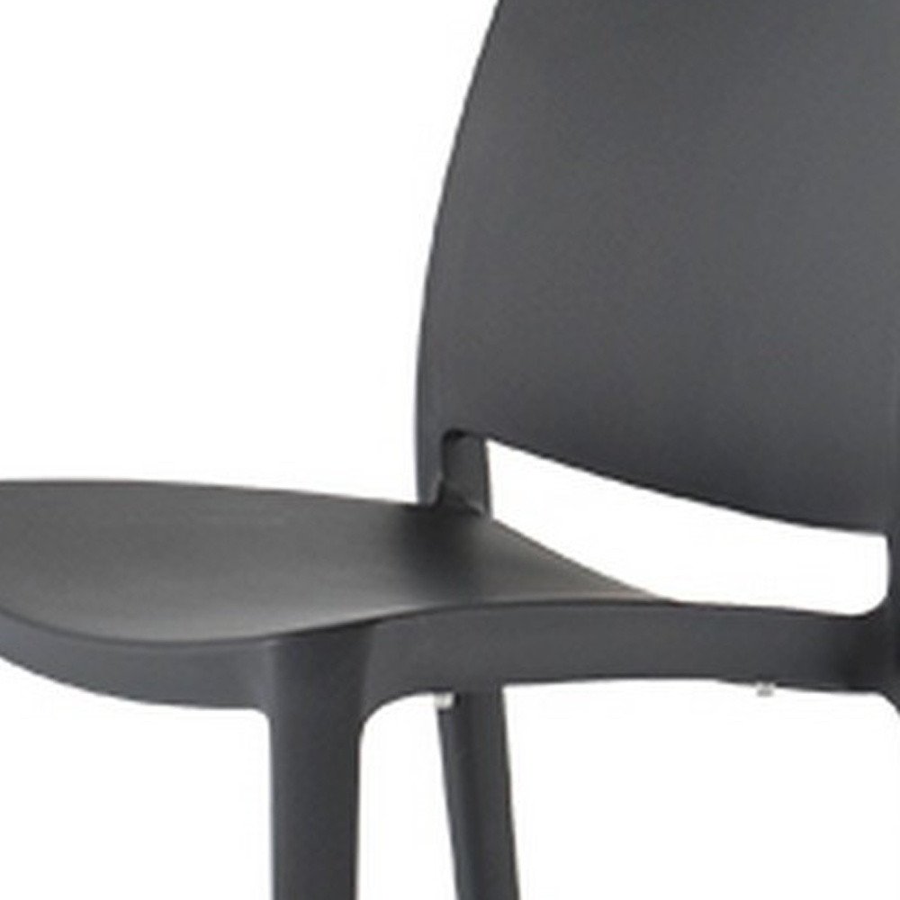 Set of Four Dark Gray Heavy Duty Plastic Outdoor Stacking Dining Chairs HomeRoots