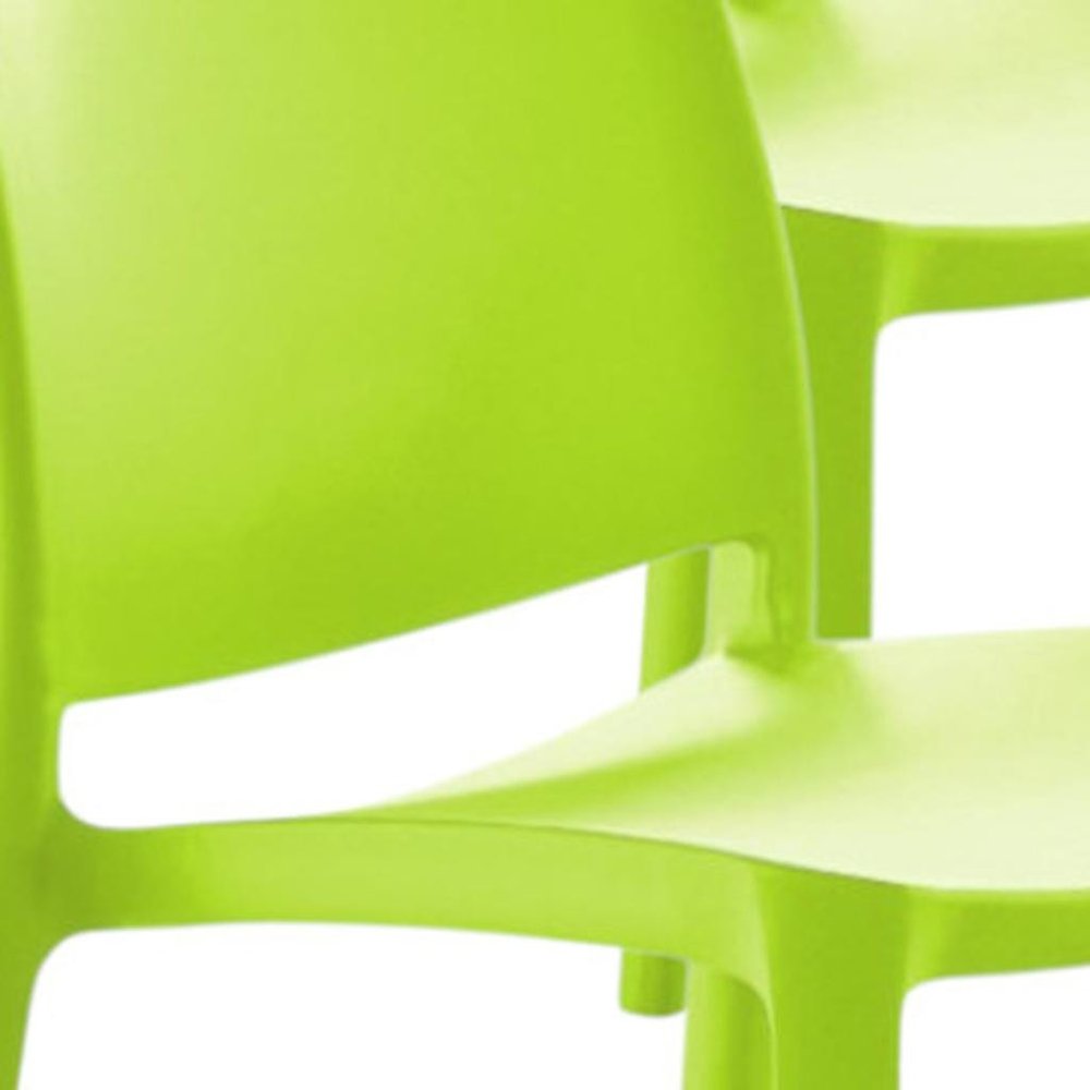 Set of Four Green Heavy Duty Plastic Outdoor Stacking Dining Chairs HomeRoots