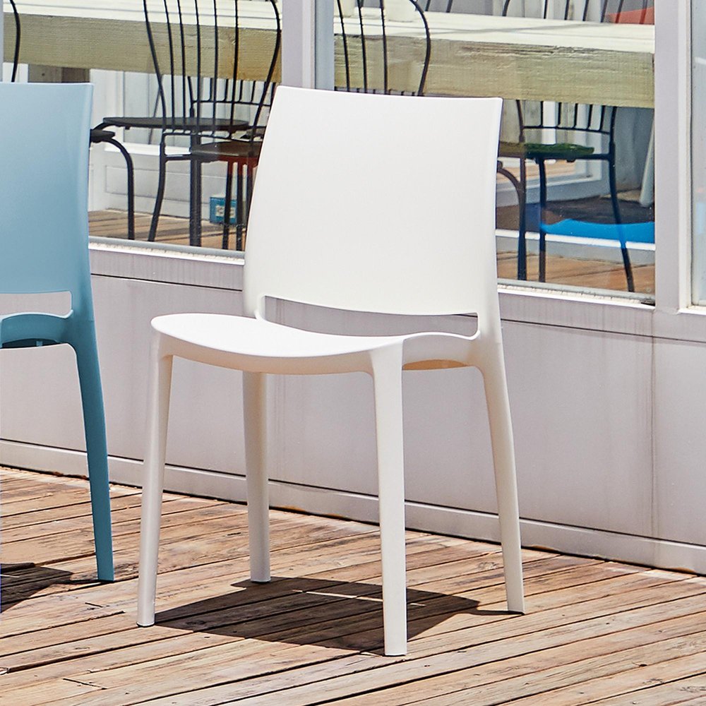 Set of Four White Heavy Duty Plastic Outdoor Stacking Dining Chairs HomeRoots