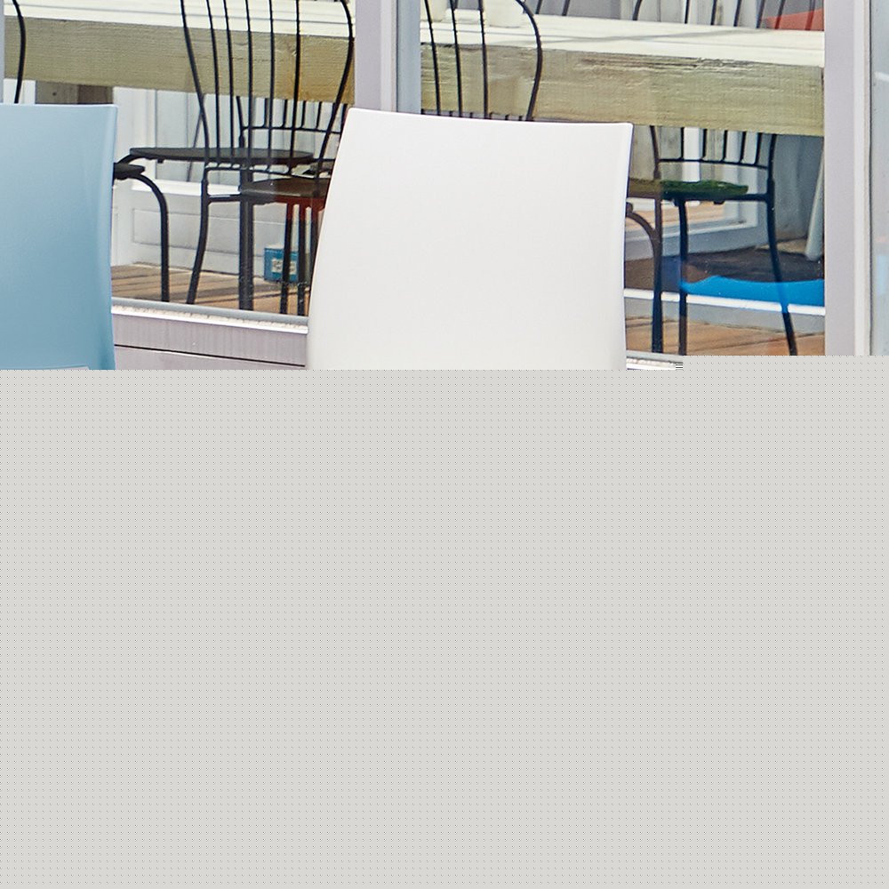 Set of Four White Heavy Duty Plastic Outdoor Stacking Dining Chairs HomeRoots
