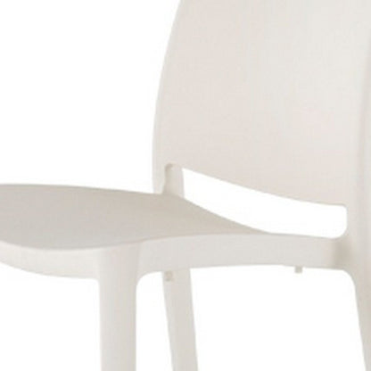 Set of Four White Heavy Duty Plastic Outdoor Stacking Dining Chairs HomeRoots
