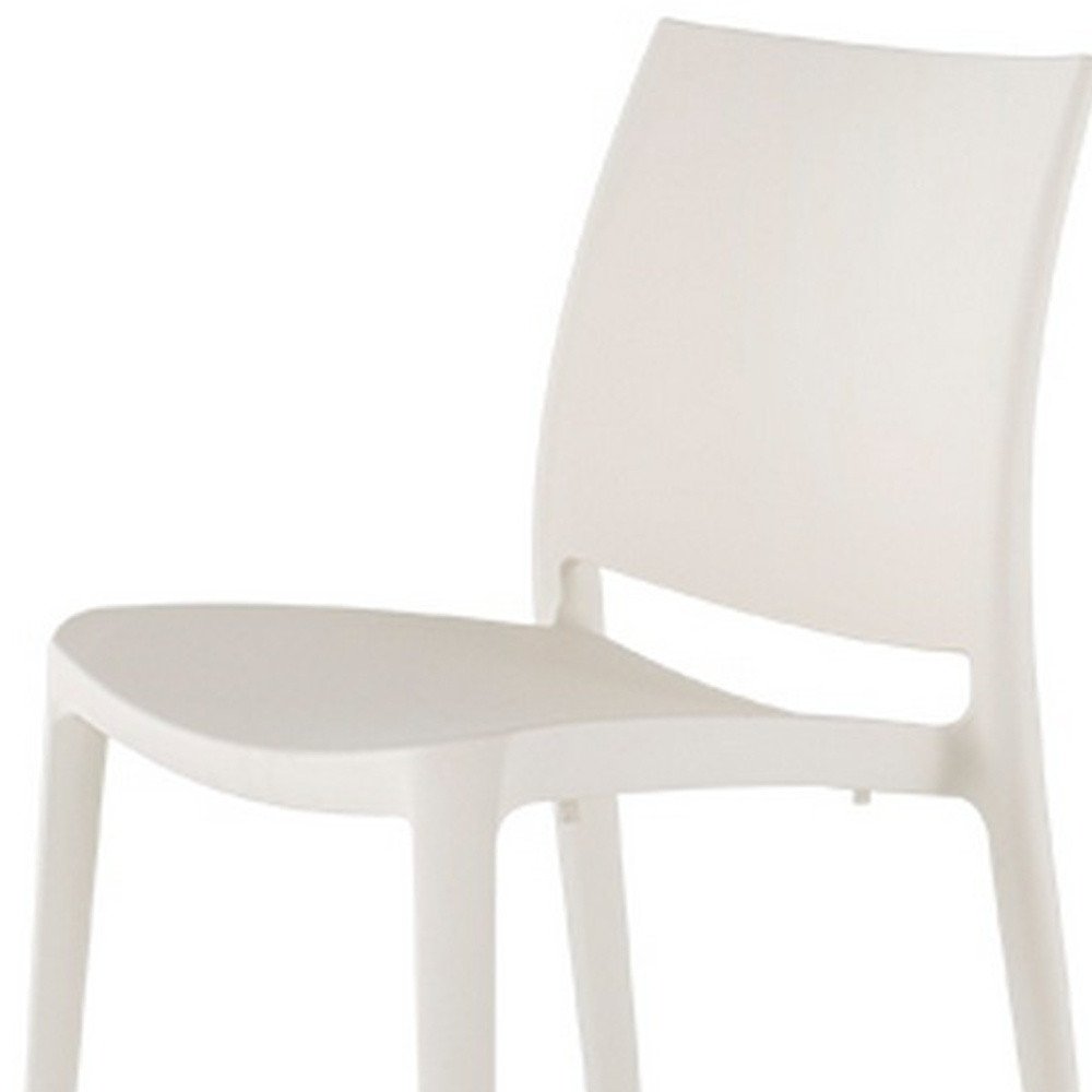 Set of Four White Heavy Duty Plastic Outdoor Stacking Dining Chairs HomeRoots