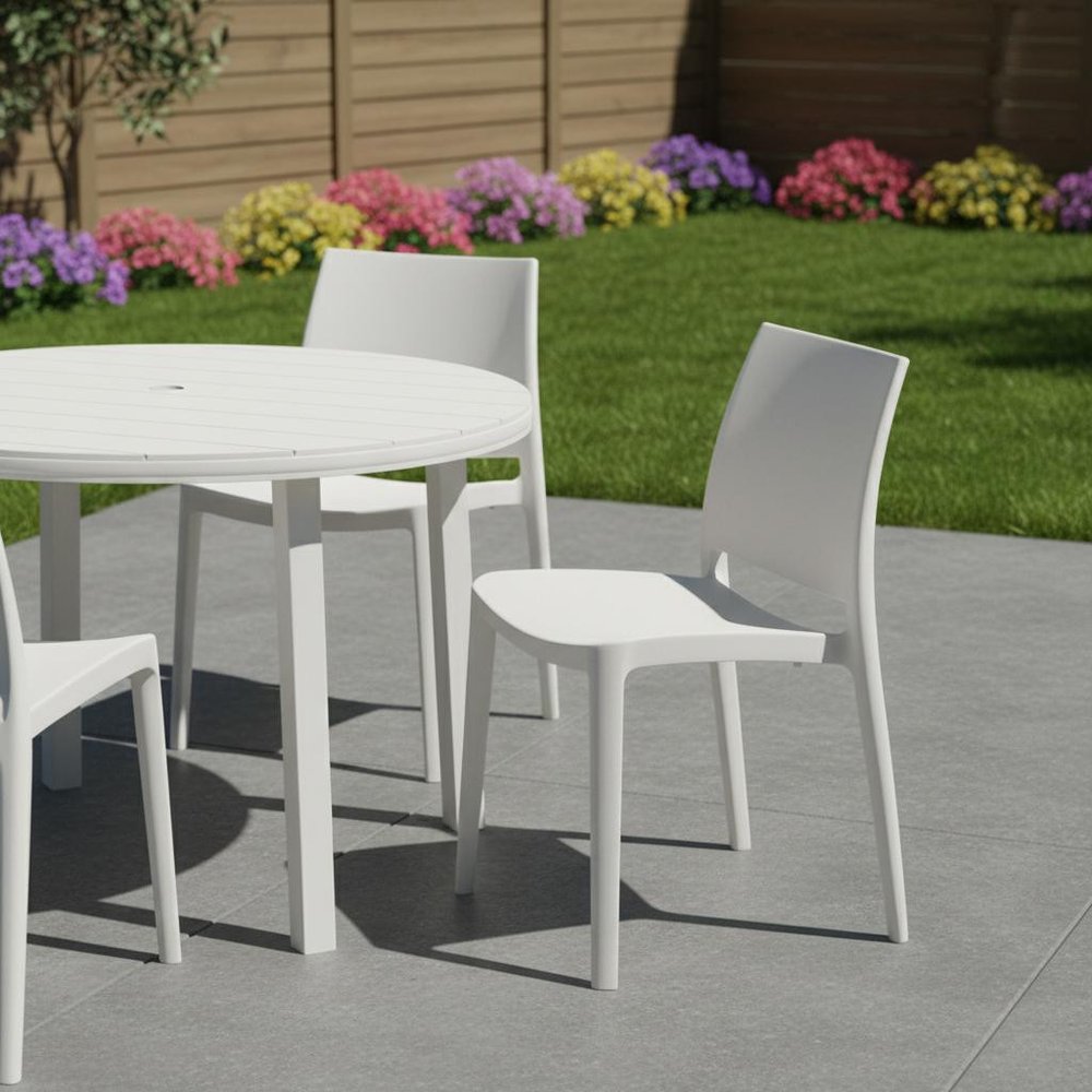 Set of Four White Heavy Duty Plastic Outdoor Stacking Dining Chairs HomeRoots