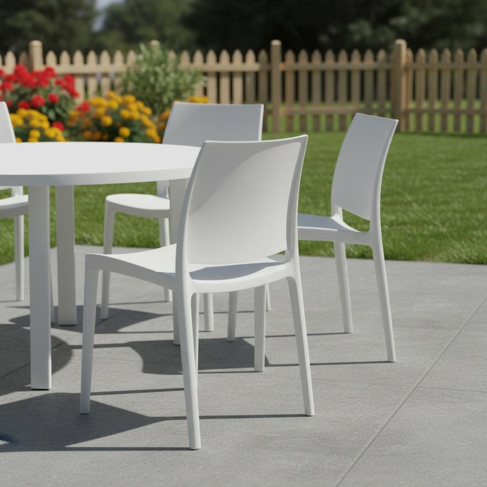 Set of Four White Heavy Duty Plastic Outdoor Stacking Dining Chairs HomeRoots