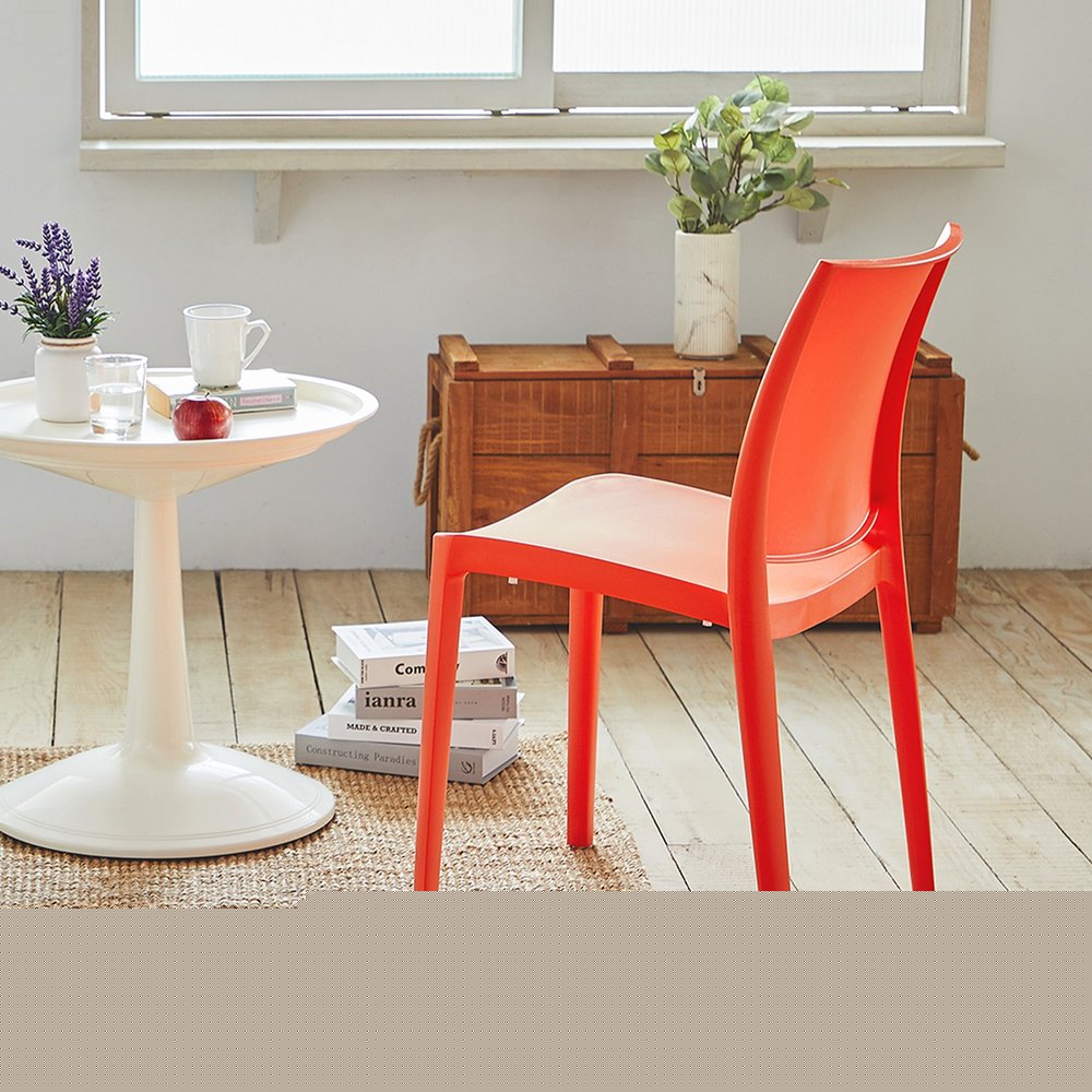 Set of Four Orange Heavy Duty Plastic Outdoor Stacking Dining Chairs HomeRoots