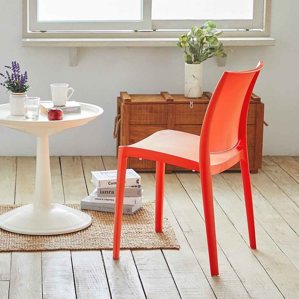 Set of Four Orange Heavy Duty Plastic Outdoor Stacking Dining Chairs HomeRoots
