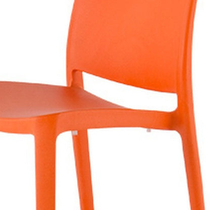 Set of Four Orange Heavy Duty Plastic Outdoor Stacking Dining Chairs HomeRoots
