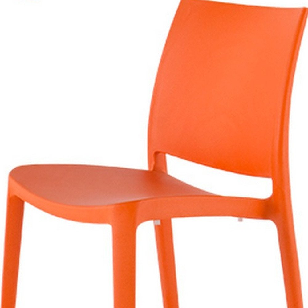 Set of Four Orange Heavy Duty Plastic Outdoor Stacking Dining Chairs HomeRoots