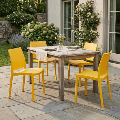 Set of Four Gold Heavy Duty Plastic Outdoor Stacking Dining Chairs HomeRoots