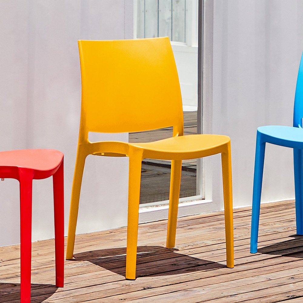 Set of Four Gold Heavy Duty Plastic Outdoor Stacking Dining Chairs HomeRoots