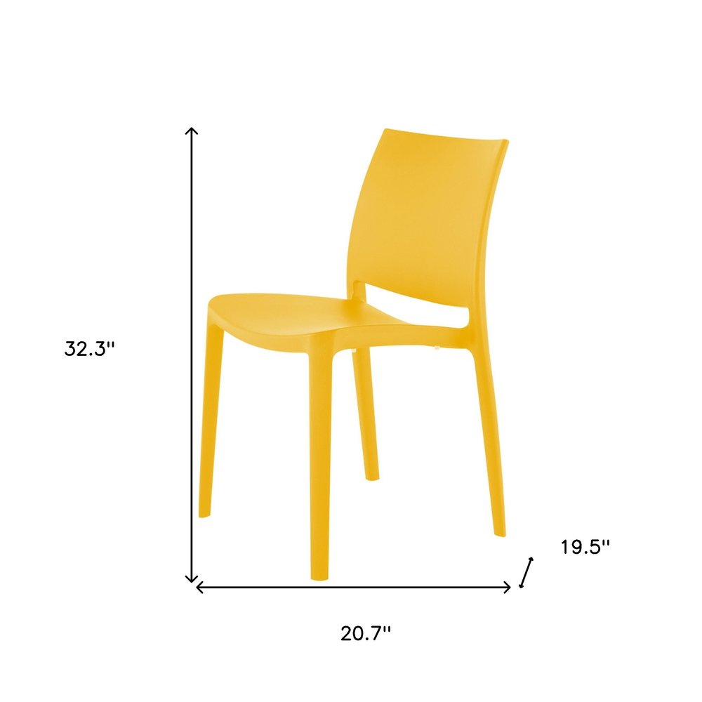Set of Four Gold Heavy Duty Plastic Outdoor Stacking Dining Chairs HomeRoots