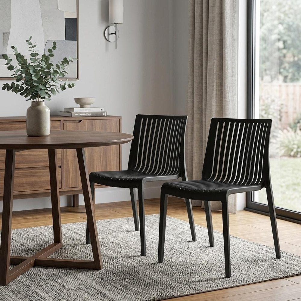 Set of Two Black Heavy Duty Plastic Outdoor Stacking Accent Chairs HomeRoots