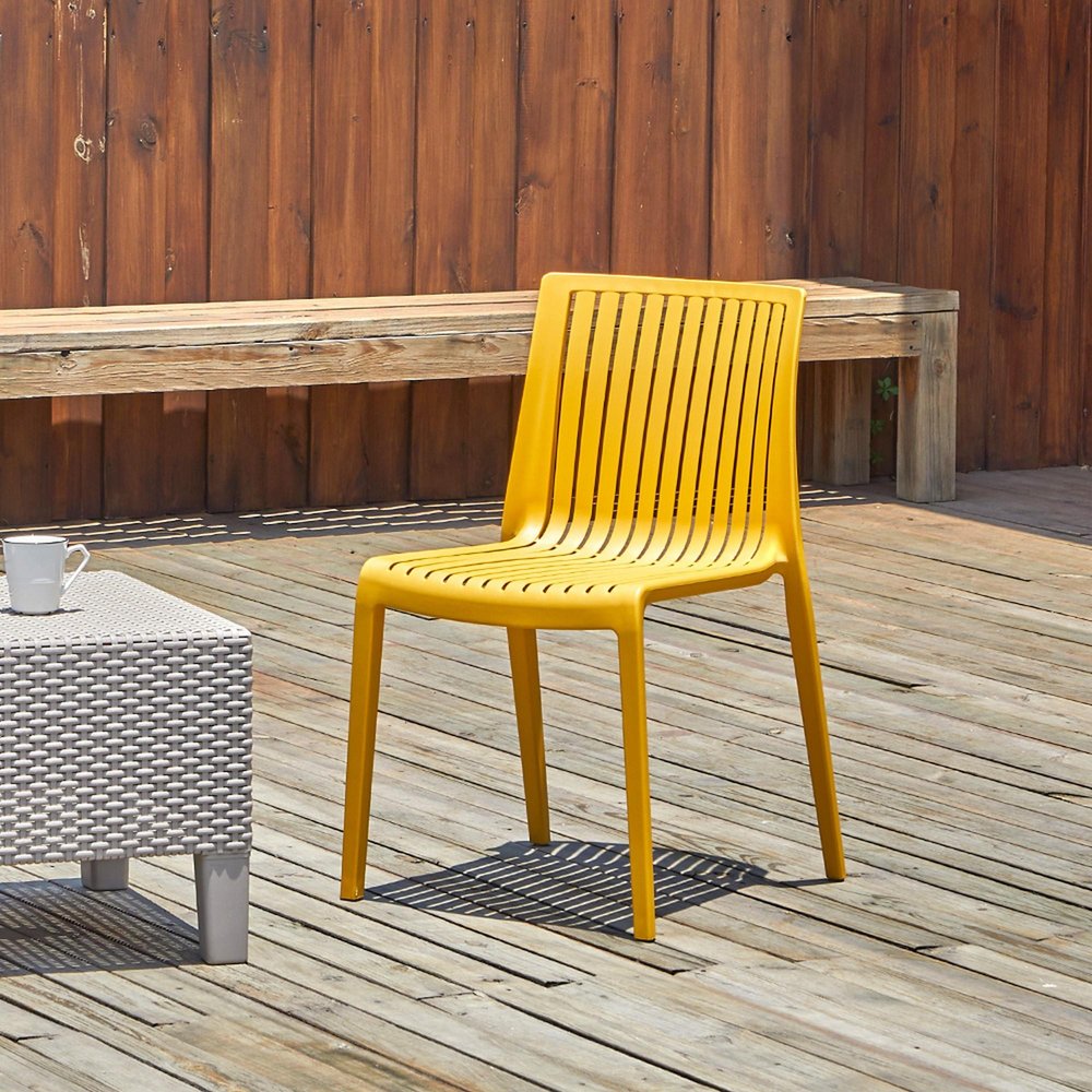 Set of Two Gold Heavy Duty Plastic Outdoor Stacking Accent Chairs HomeRoots