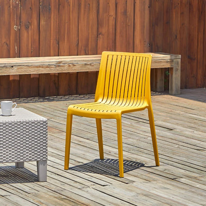 Set of Two Gold Heavy Duty Plastic Outdoor Stacking Accent Chairs HomeRoots