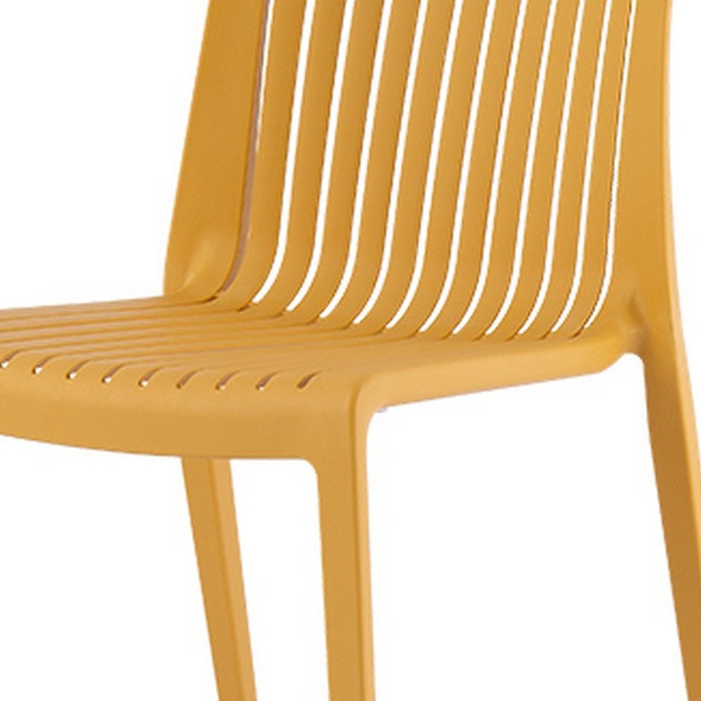 Set of Two Gold Heavy Duty Plastic Outdoor Stacking Accent Chairs HomeRoots