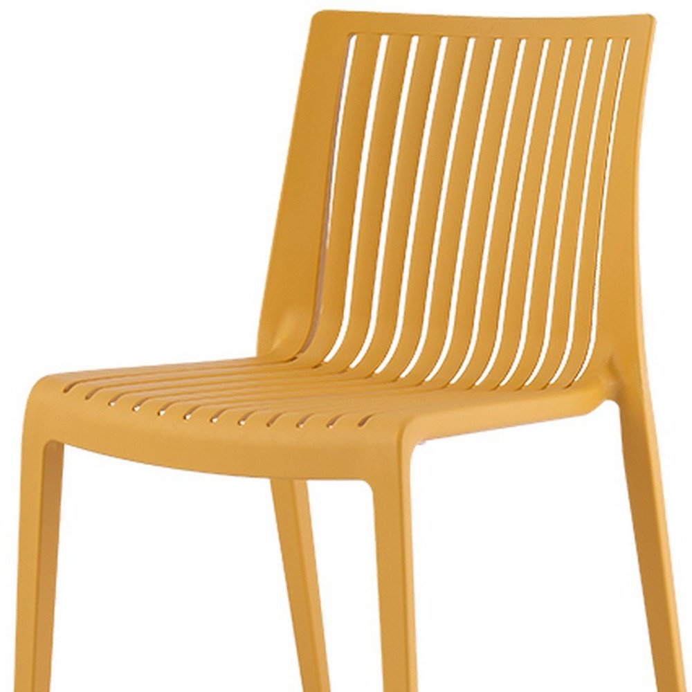 Set of Two Gold Heavy Duty Plastic Outdoor Stacking Accent Chairs HomeRoots