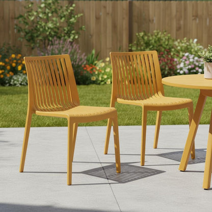 Set of Two Gold Heavy Duty Plastic Outdoor Stacking Accent Chairs HomeRoots