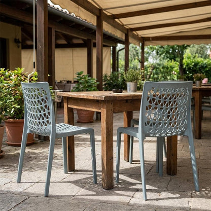Set of Two Baby Blue Heavy Duty Plastic Outdoor Stacking Dining Chairs HomeRoots