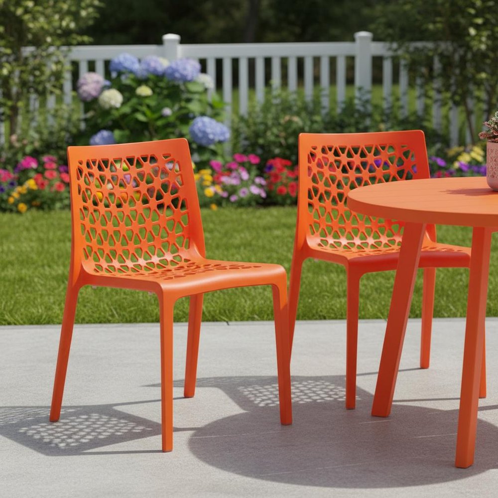 Set of Two Orange Heavy Duty Plastic Outdoor Stacking Dining Chairs HomeRoots