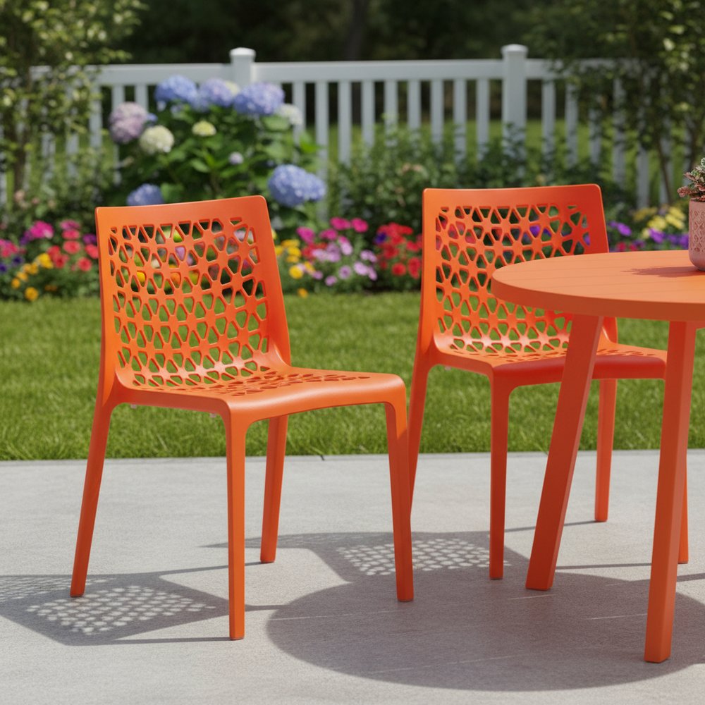 Set of Two Orange Heavy Duty Plastic Outdoor Stacking Dining Chairs HomeRoots